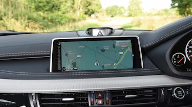 The infotainment system is easy to use thanks to BMW's iDrive controller, and features internet services