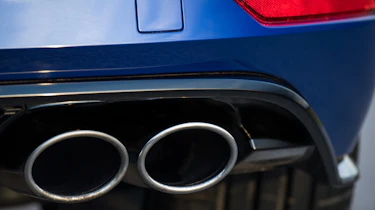 Quad tailpipes remind following traffic that this is no ordinary Golf