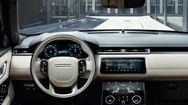 Range Rover has pulled out all the stops inside the Velar, and also removed almost all the buttons, save three rotary dials