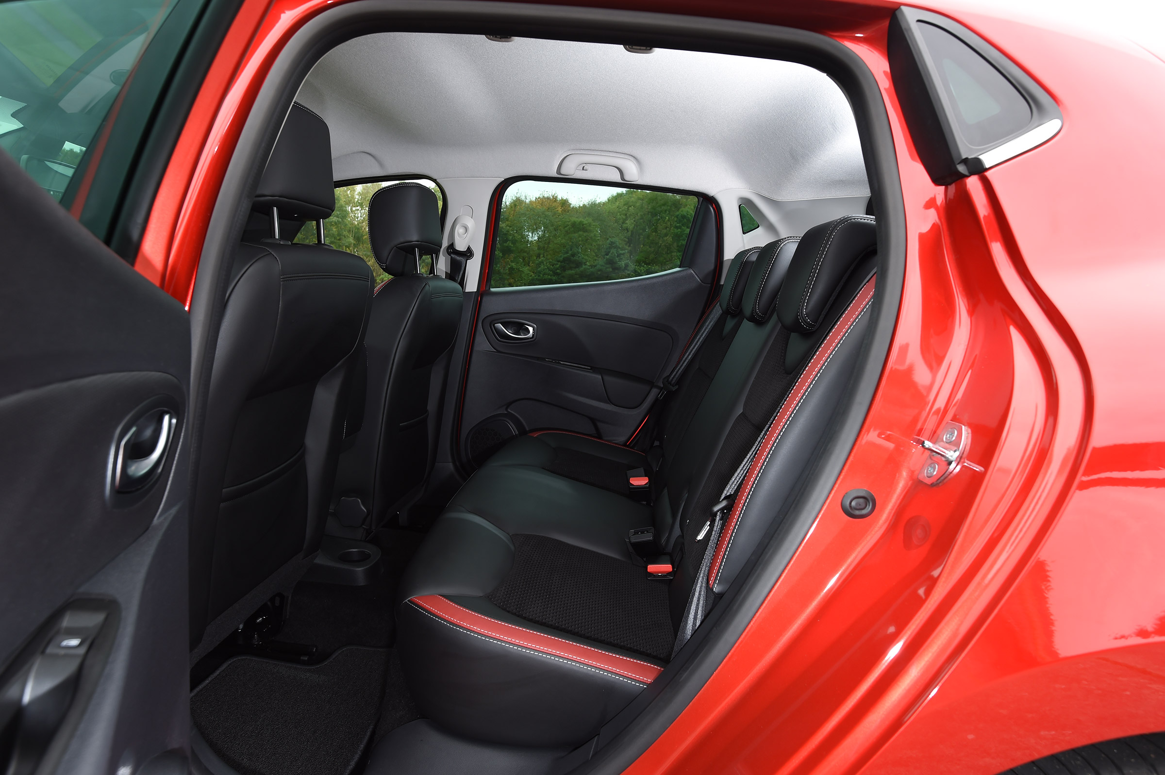 The rear doors make access to the back seats easy, but they are quite cramped because of the sloping roofline