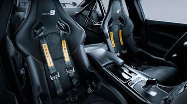 ...or a 'Track Pack' version with only two racing seats complete with motorsport-style four-point safety harnesses.