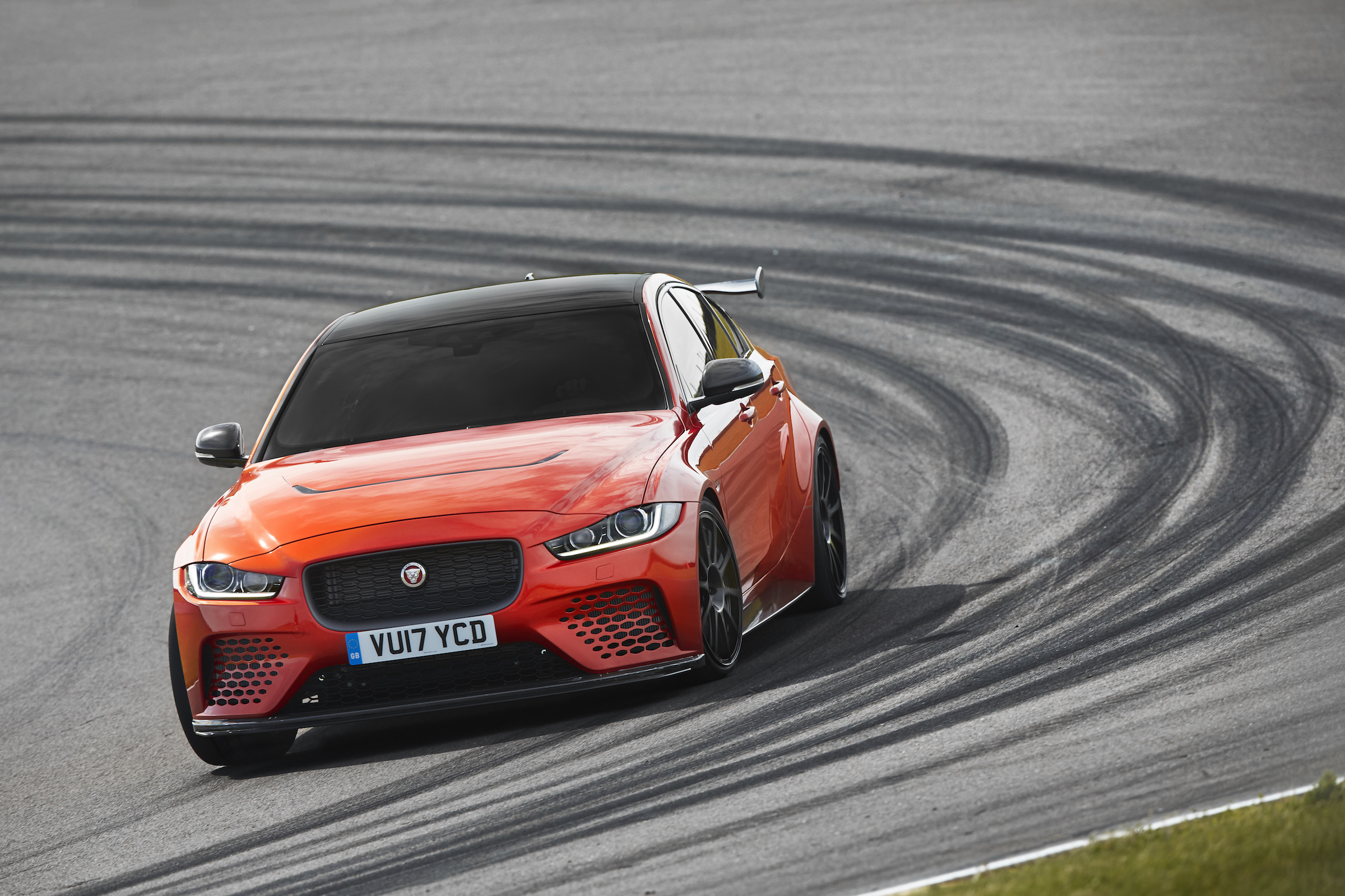 Strong, weight-saving carbon-fibre has been used for the bonnet, front and rear bumpers...