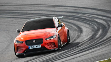Strong, weight-saving carbon-fibre has been used for the bonnet, front and rear bumpers...