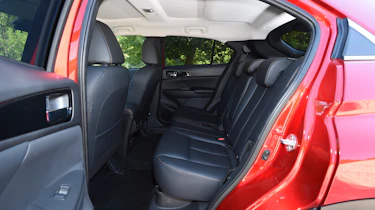 ...but passengers in the back seat may find that the the curving roofline does.