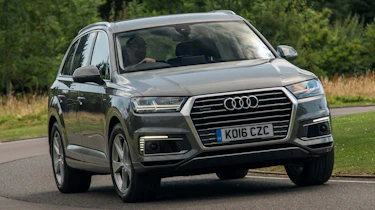 The Audi Q7 e-tron is a plug-in hybrid SUV that goes up against similar rivals from BMW and Volvo