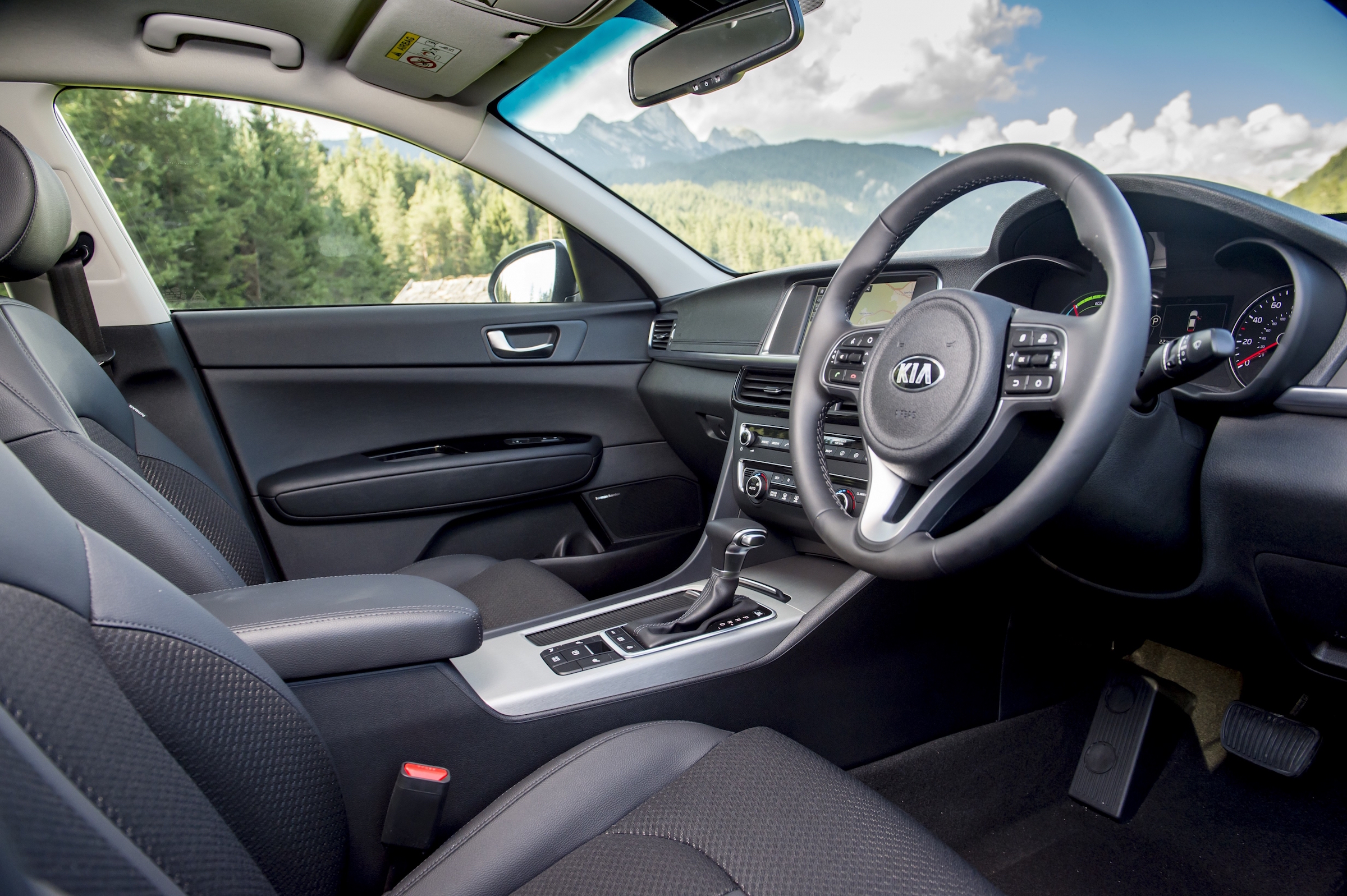 The interior is just like the regular Optima, save for a different set of gauges and some new buttons for its driving modes