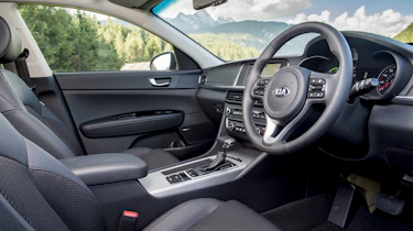 The interior is just like the regular Optima, save for a different set of gauges and some new buttons for its driving modes