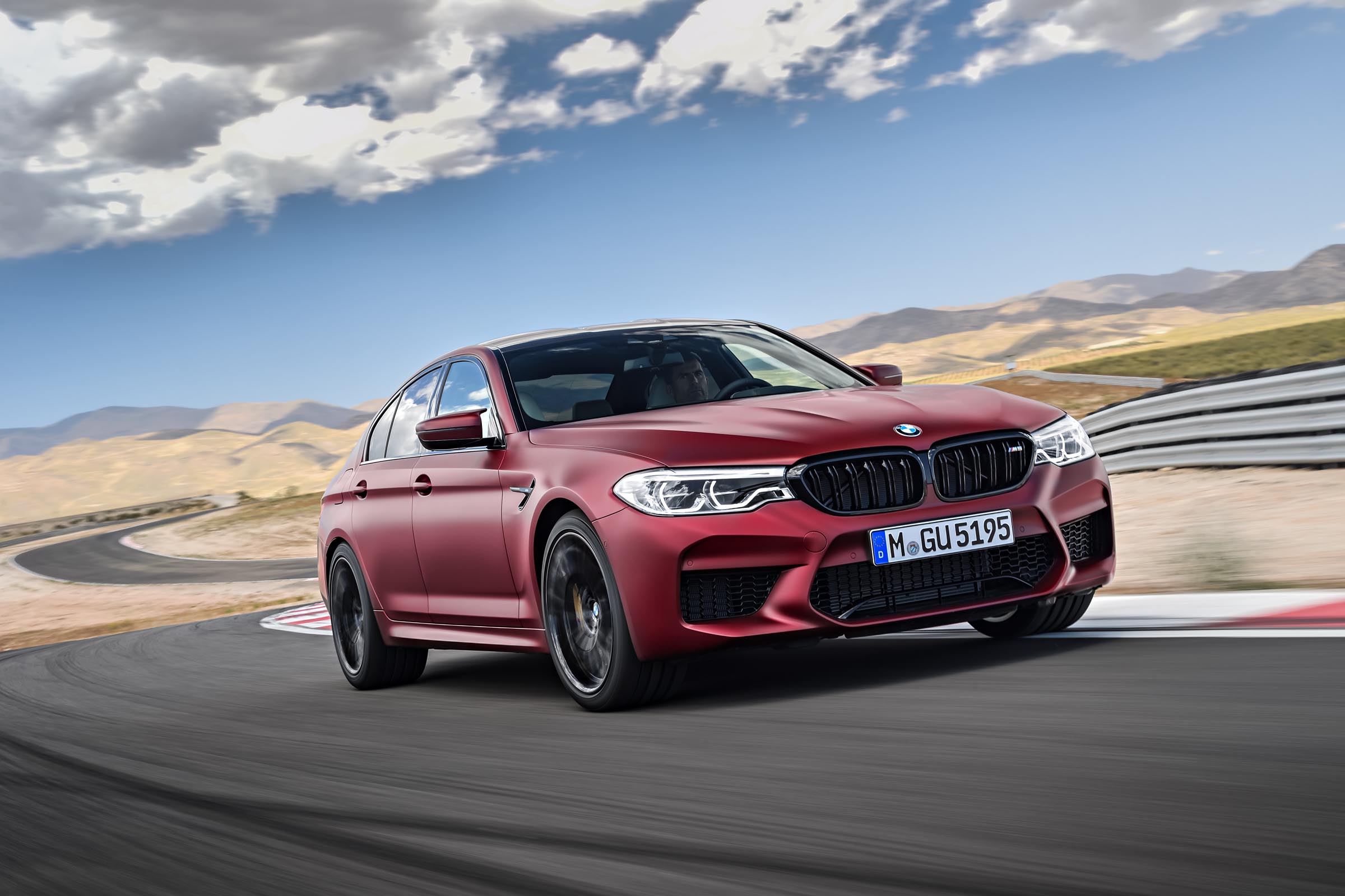 BMW M5 driving on racetrack