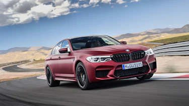 BMW M5 driving on racetrack