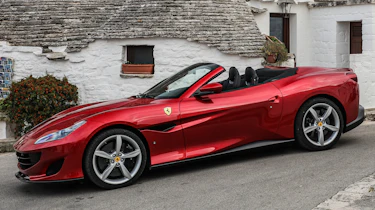 The interior boasts a 10.25-inch infotainment display and digital instruments that flank a yellow rev gauge