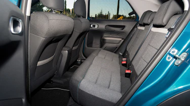 There is a good amount of room in the back for adults but the rear windows don't roll down