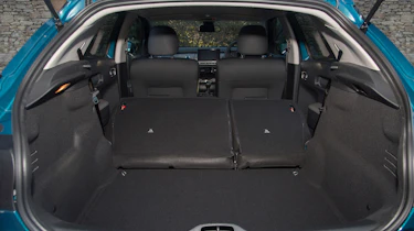 Rear seats split 60:40 and increase total boot space to 1,170, but there's a step in the floor, hampering practicality