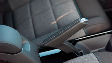The old awkward handbrake has been replaced by a more conventional lever