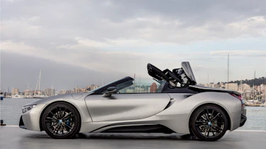 A lithium-ion battery pack has enough capacity for a 33-mile range in electric-only mode...