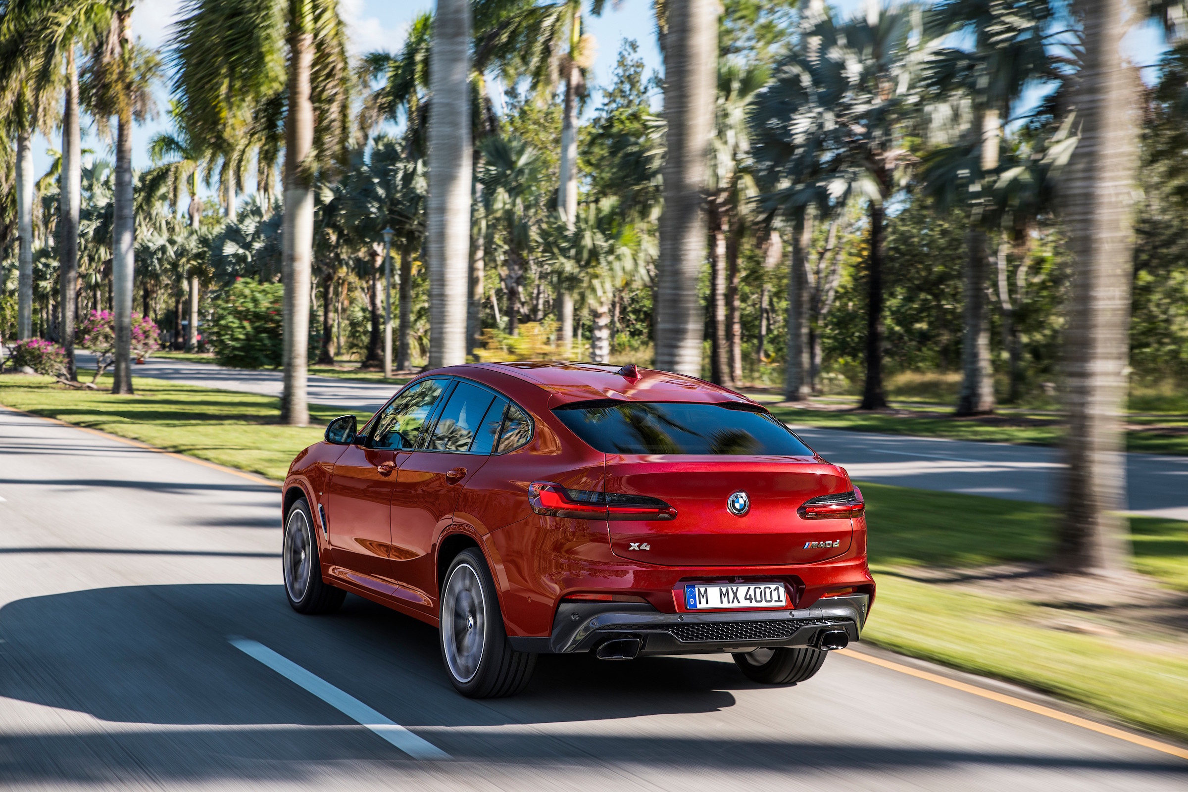 BMW X4 tracking shot, rear left