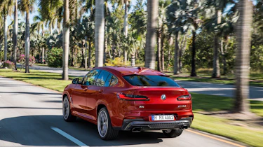 BMW X4 tracking shot, rear left