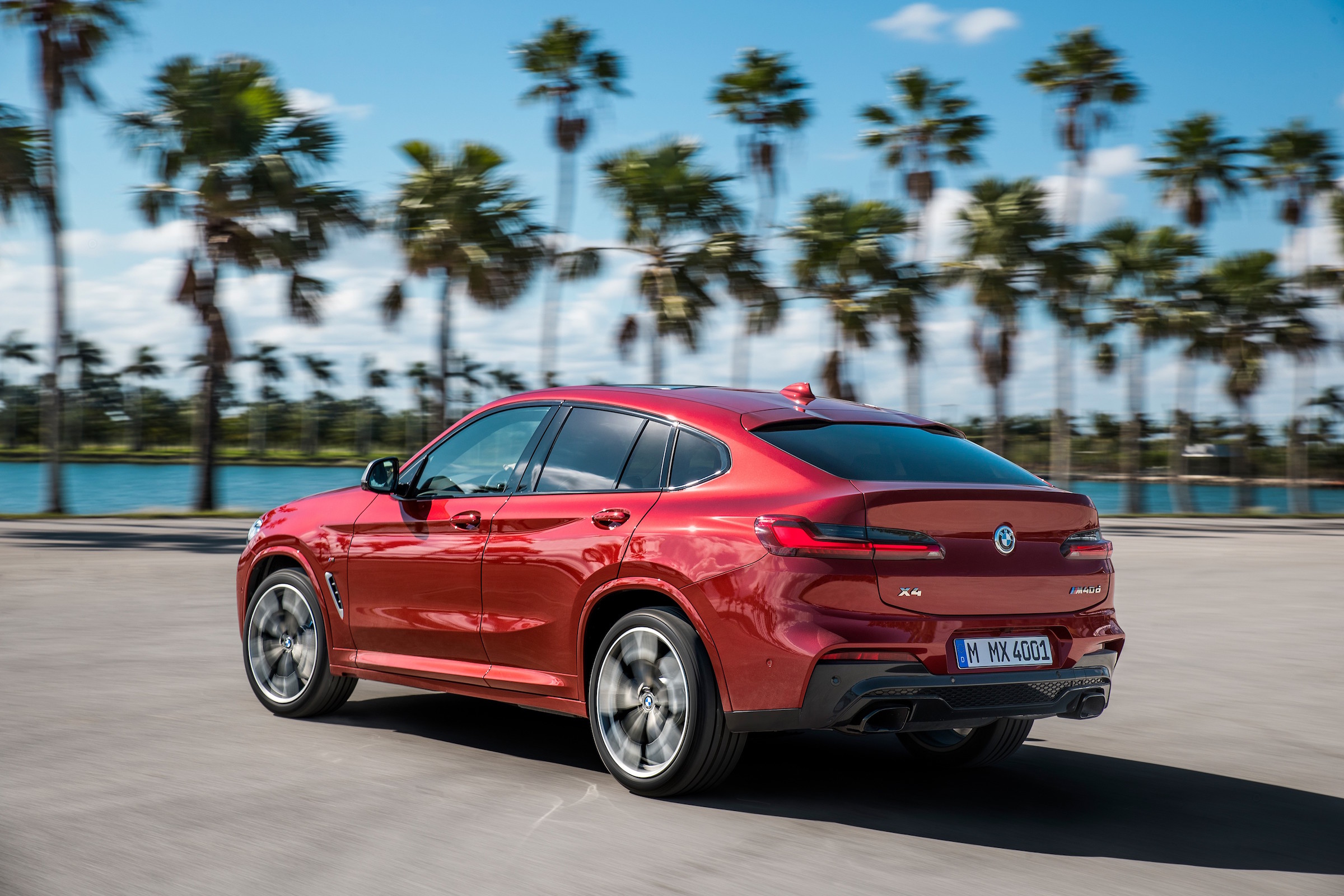 BMW X4 tracking shot, rear left