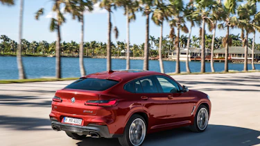 BMW X4 tracking shot, rear right