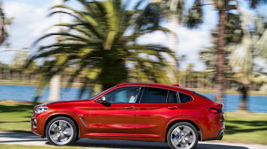BMW X4 tracking shot, left side