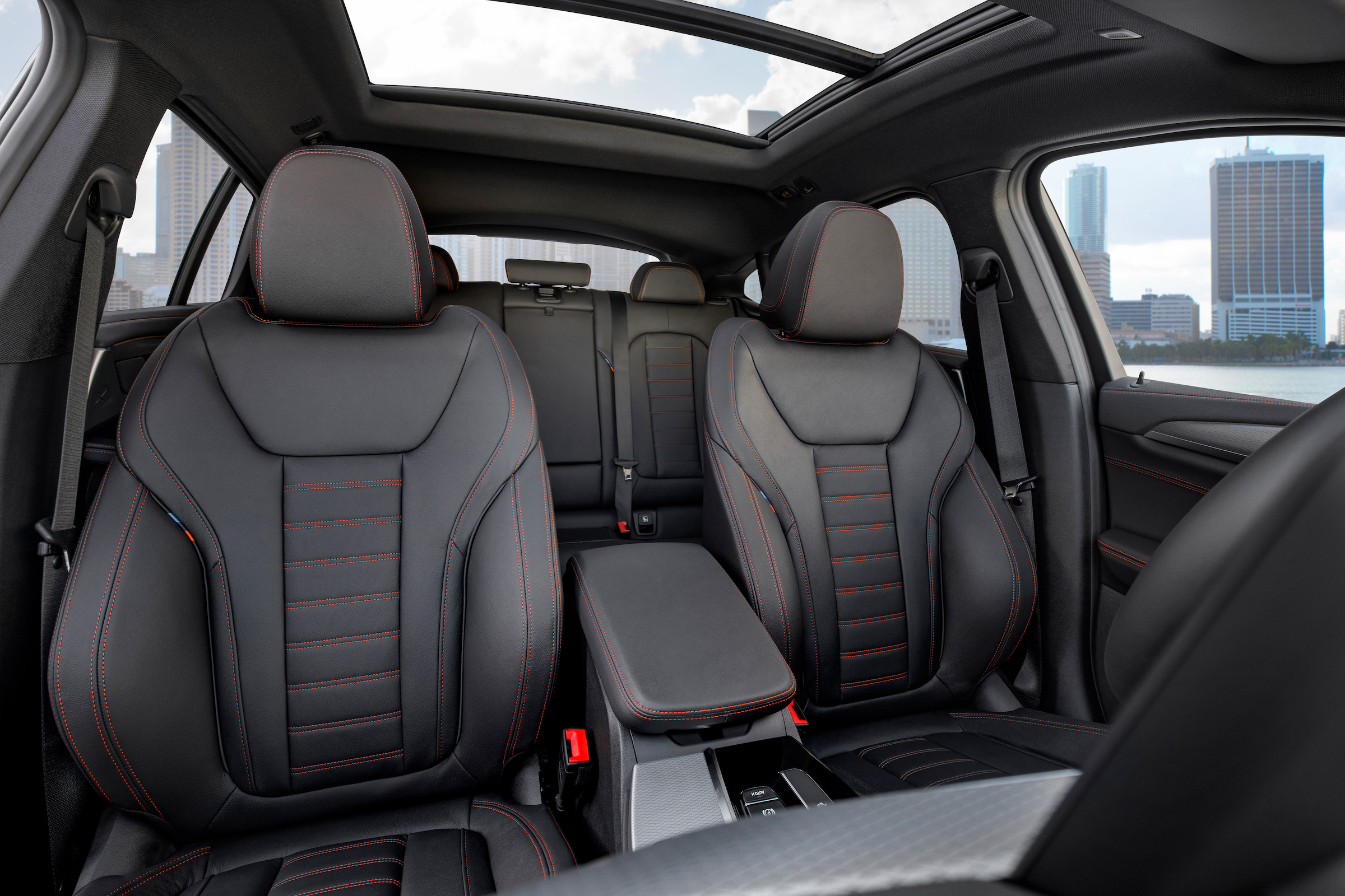 BMW X4 interior shot, front seats, looking towards back