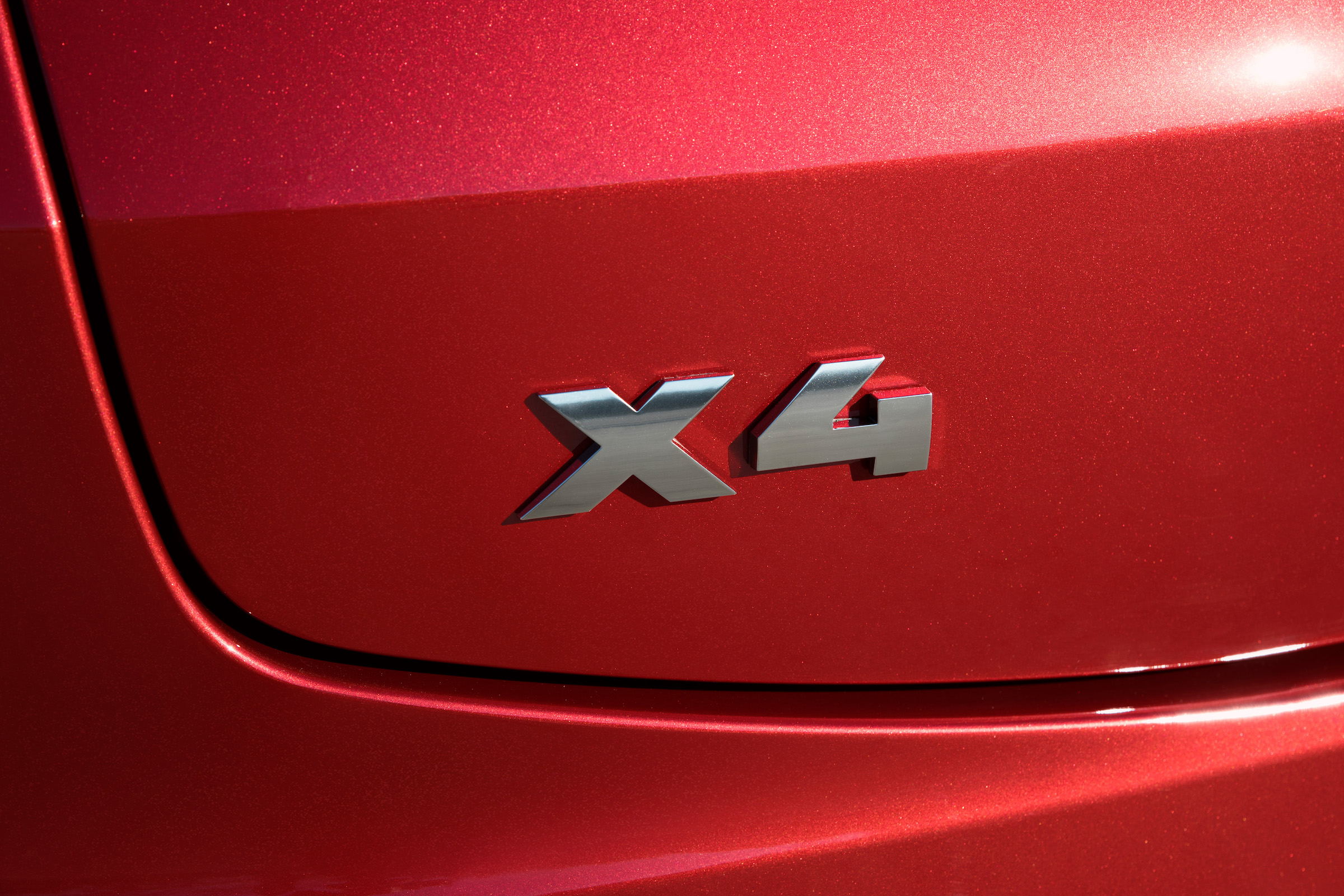 BMW X4 exterior detail shot, X4 badge