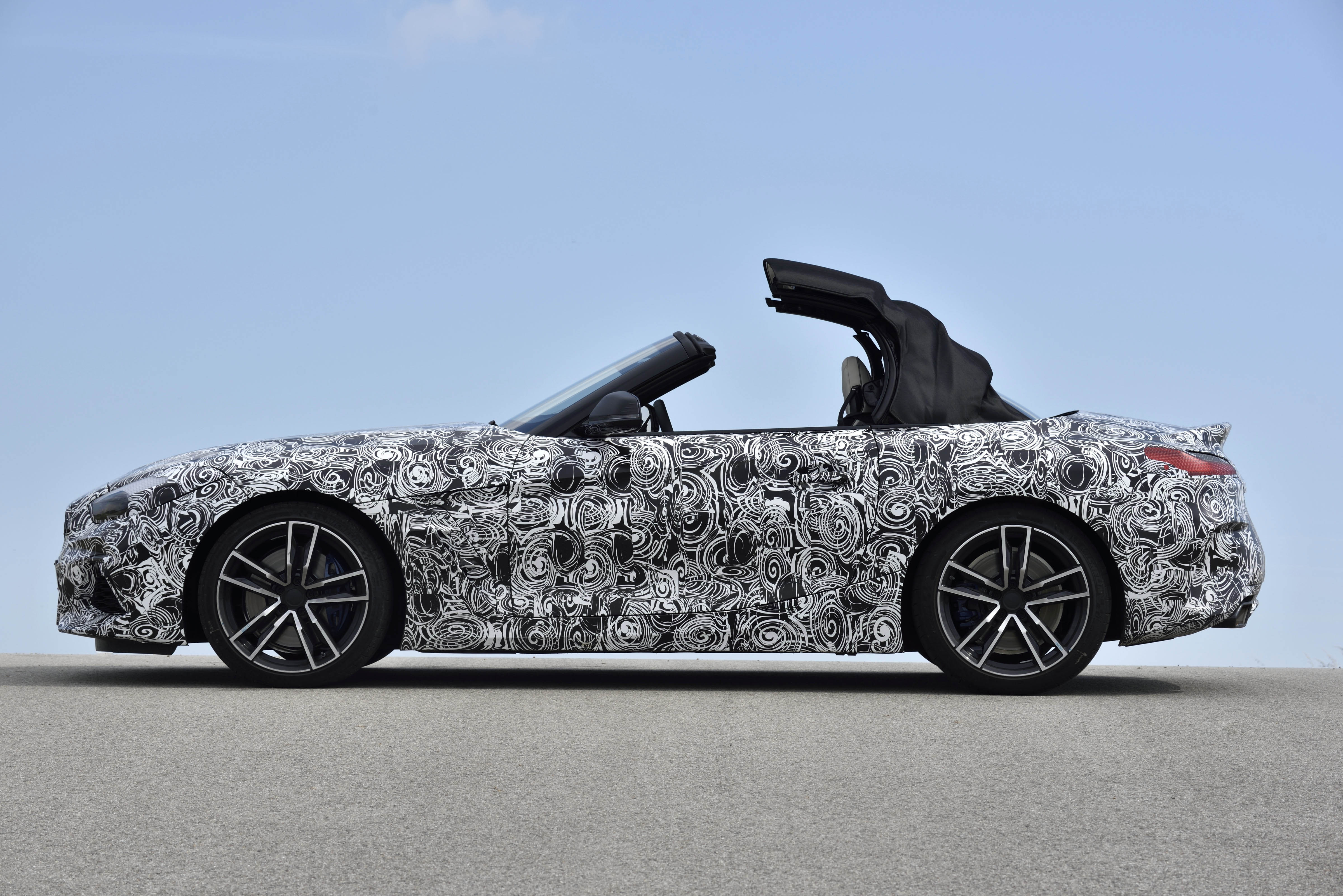 The test car wears a conventional soft top as opposed to the folding metal roof on the previous Z4.