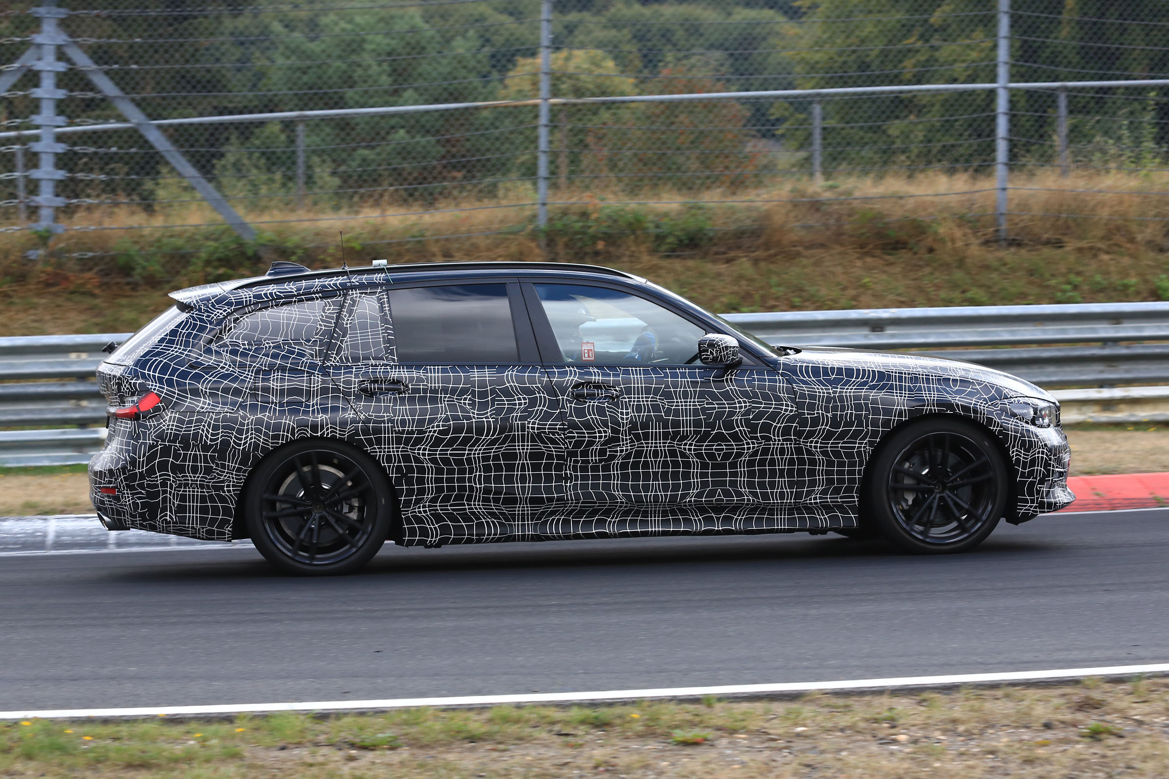 BMW 3 Series Touring tracking side profile spy shot