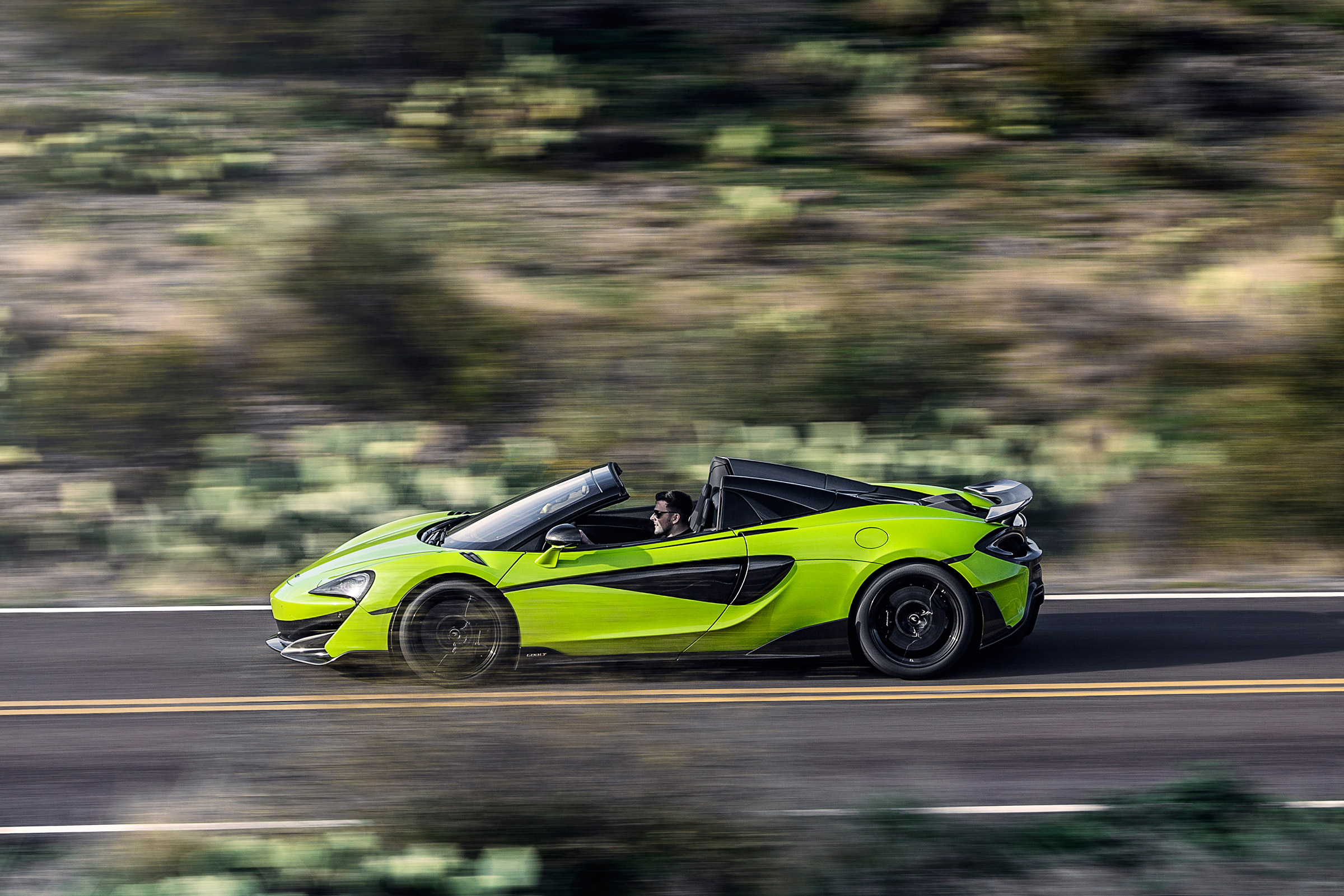 McLaren 600LT Spider convertible side tracking
