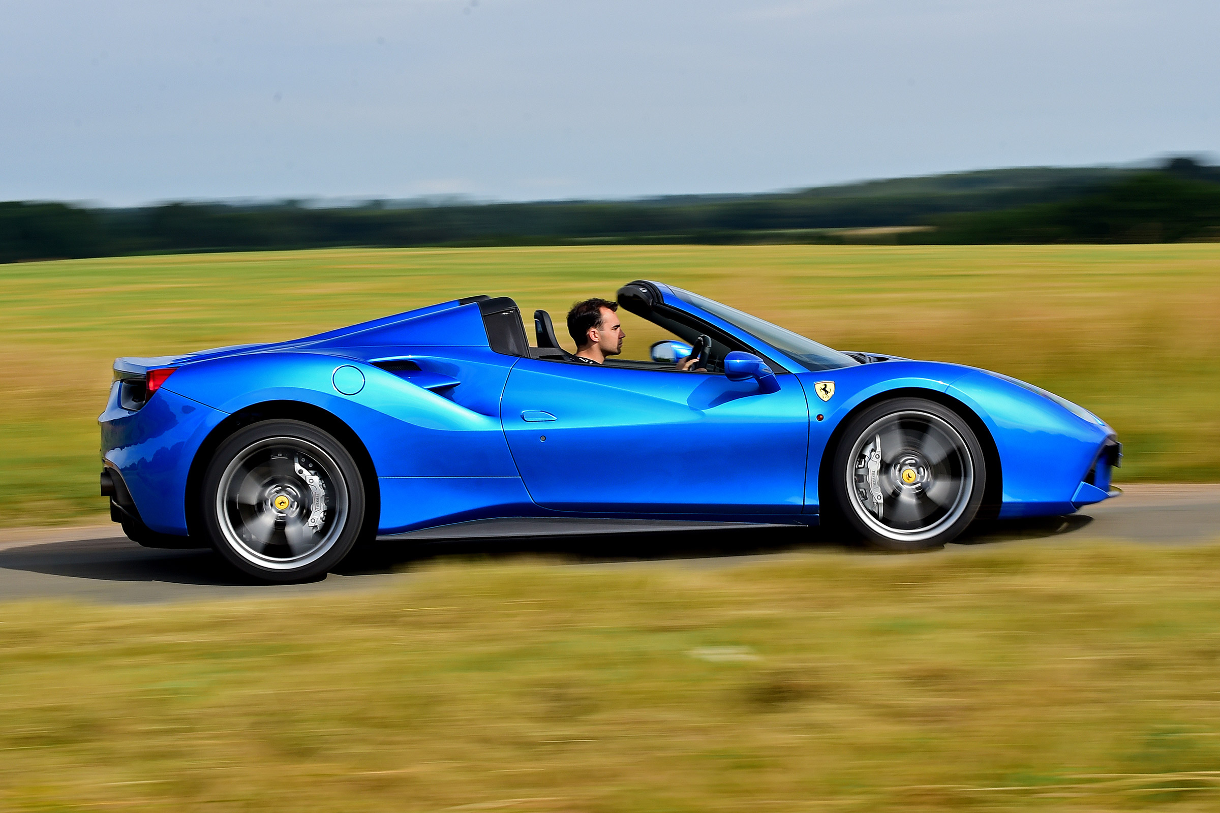 Ferrari 488 Spider convertible side tracking