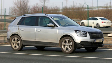Skoda Kamiq in silver driving
