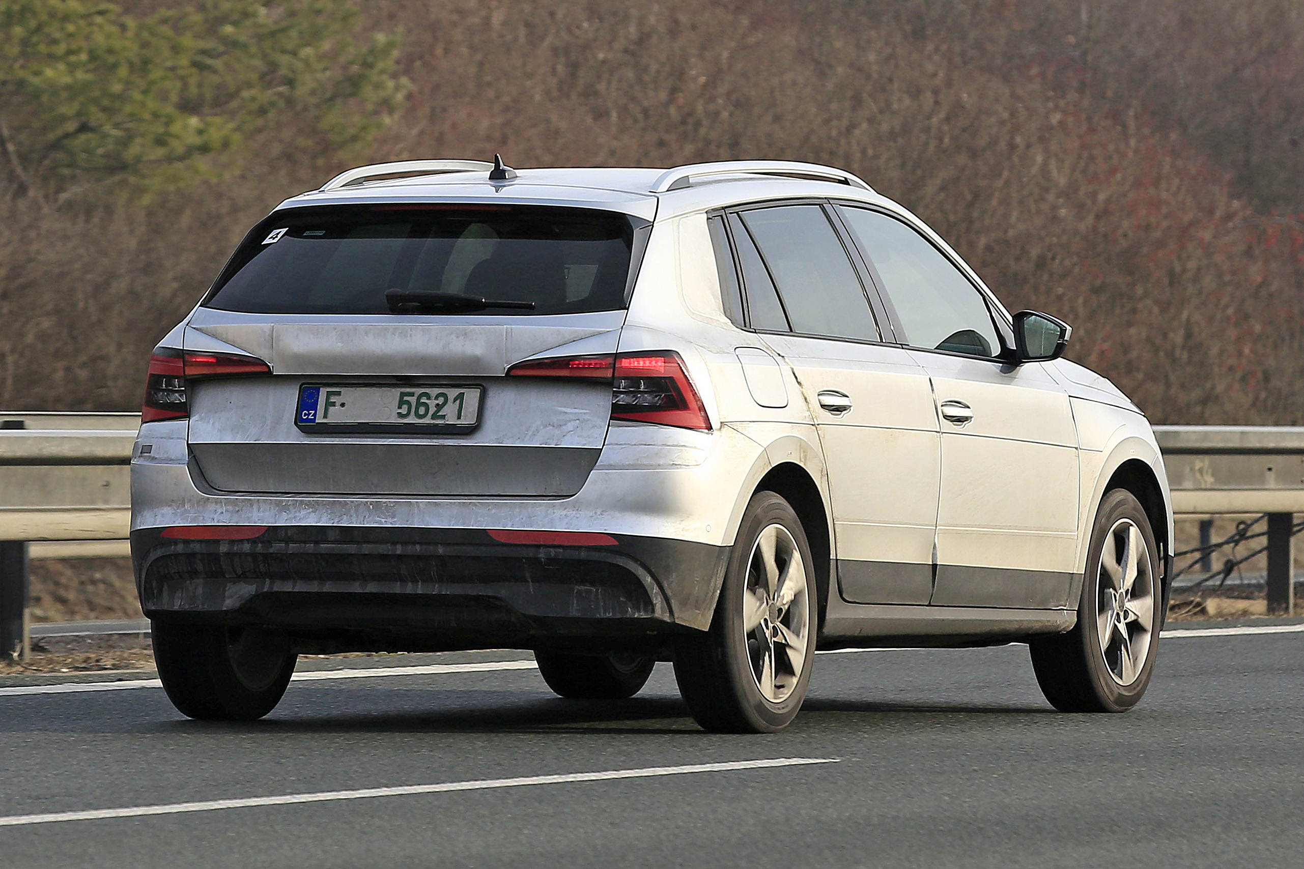 Skoda Kamiq in silver - rear view driving