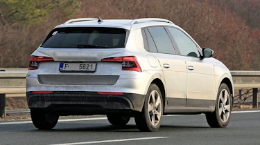 Skoda Kamiq in silver - rear view driving