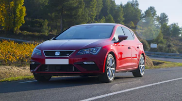 Red SEAT Leon FR driving
