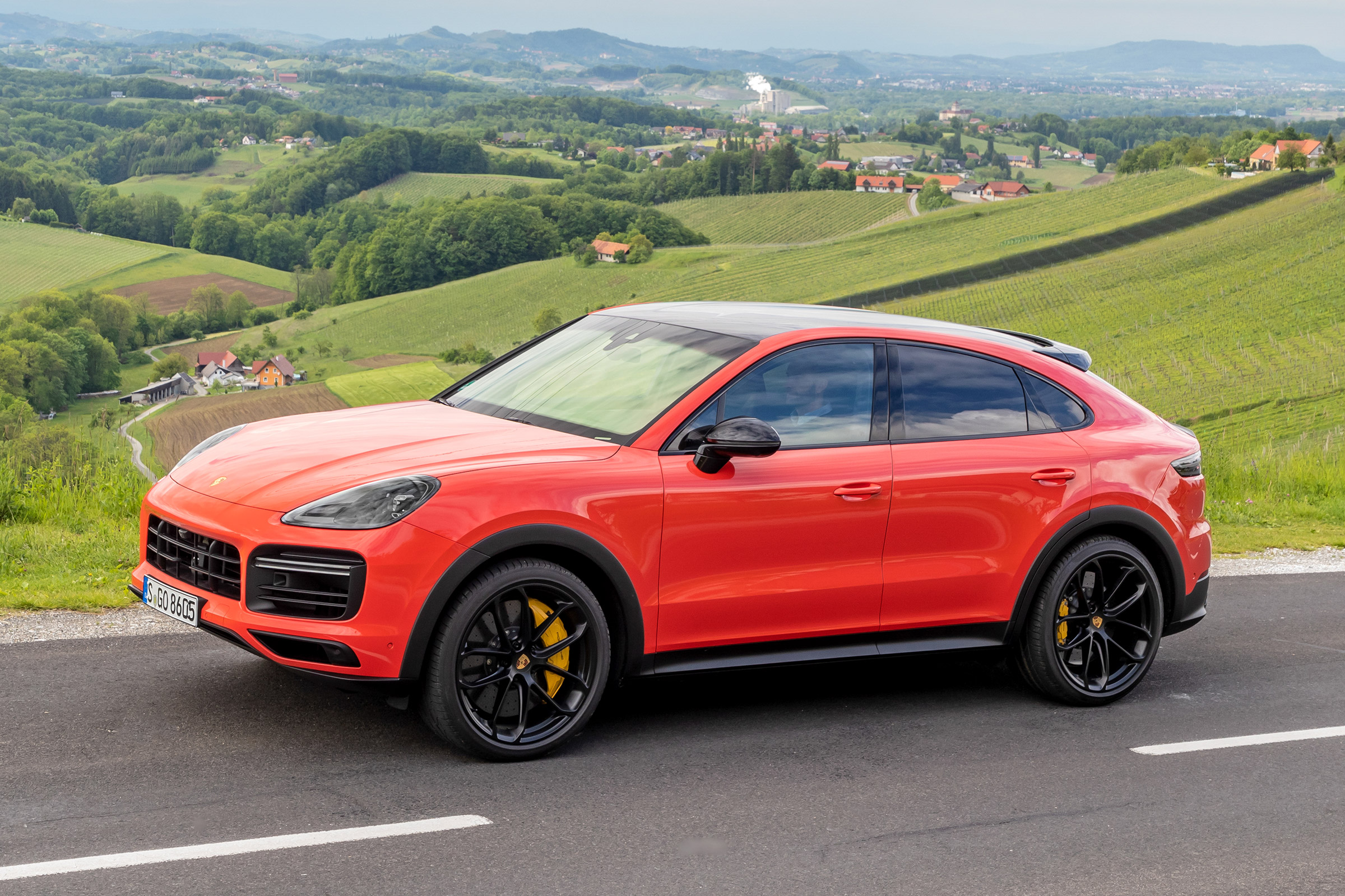 Porsche Cayenne Coupe SUV side driving