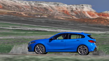 2019 BMW 1 Series M135i xDrive side panning view