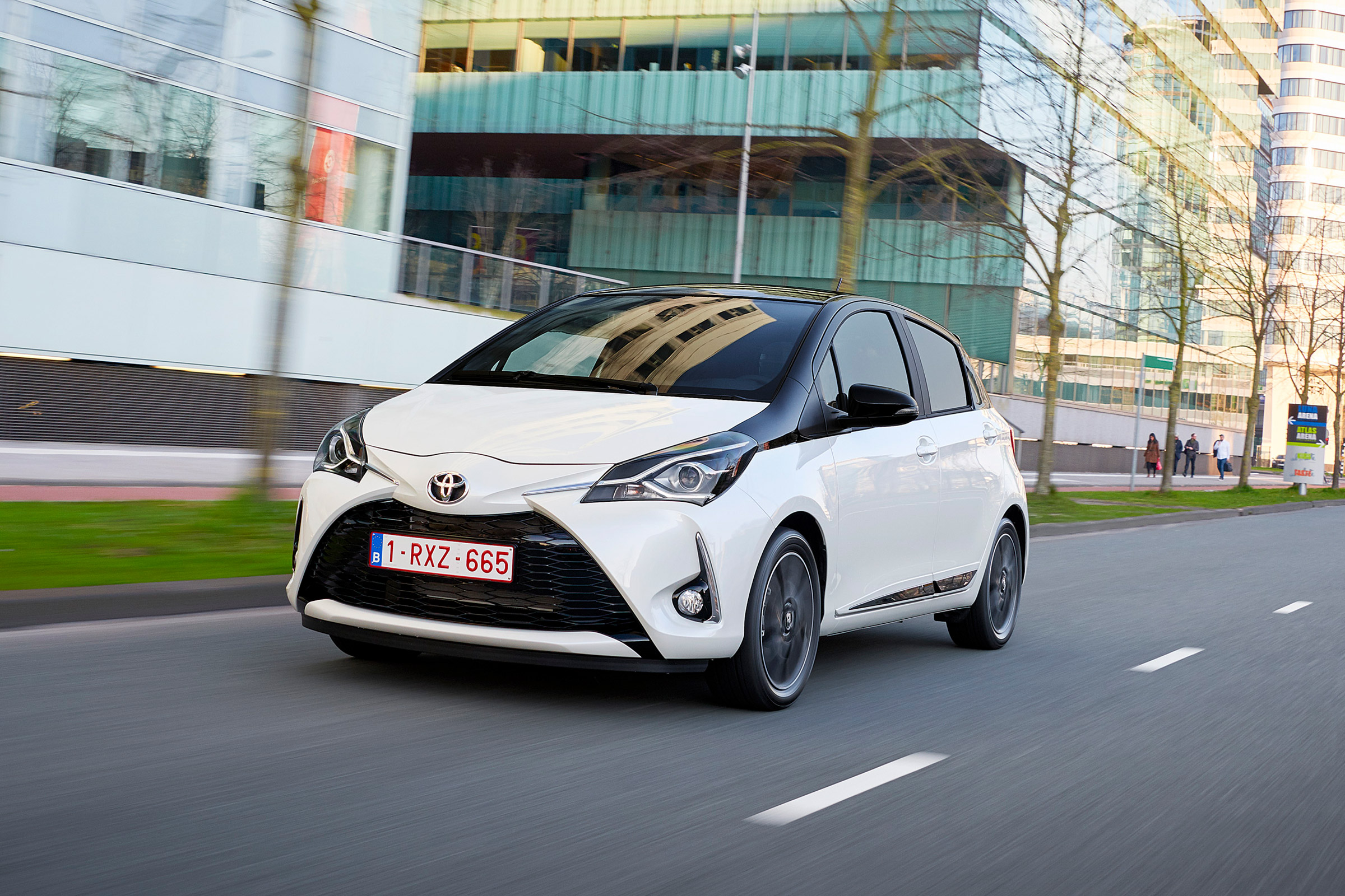 Toyota Yaris driving in a city