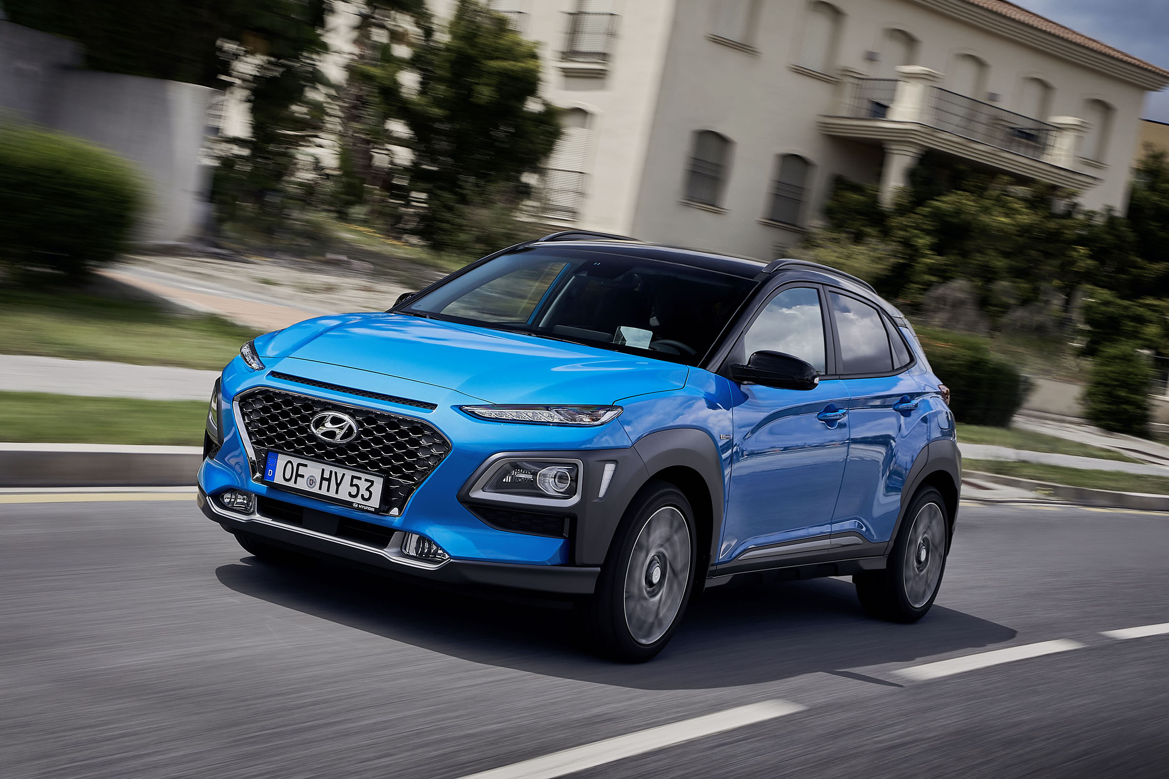 2019 Hyundai Kona Hybrid - front quarter view driving 