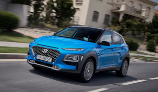 2019 Hyundai Kona Hybrid - front quarter view driving