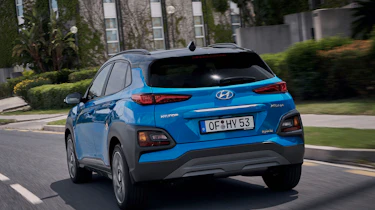 2019 Hyundai Kona Hybrid - rear quarter view driving