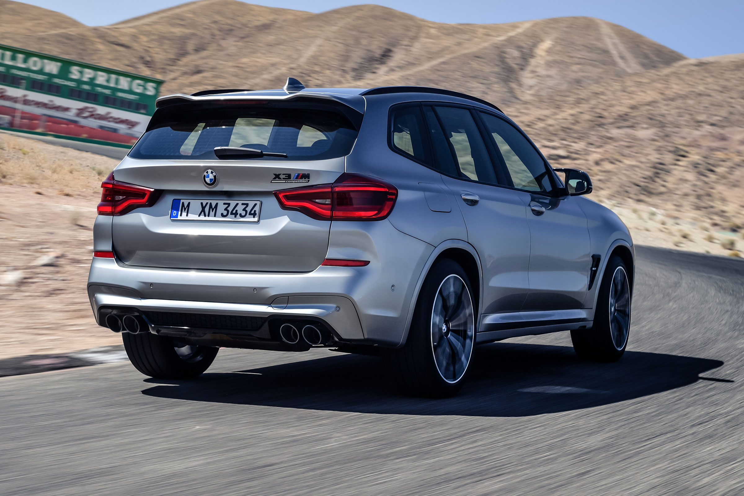 BMW X3 M Competition SUV rear 3/4 on track