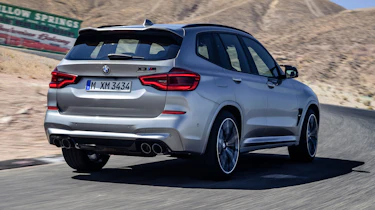 BMW X3 M Competition SUV rear 3/4 on track