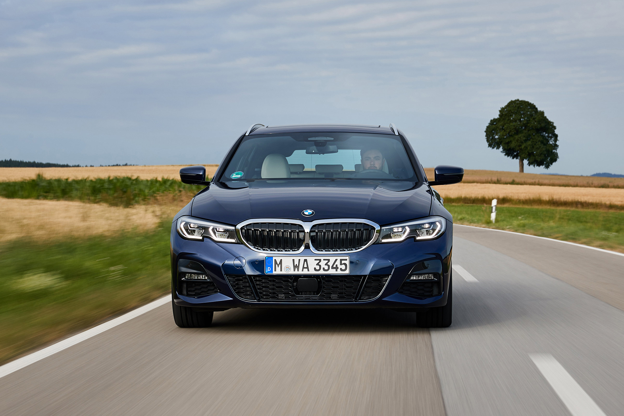 BMW 3 Series Touring estate front driving