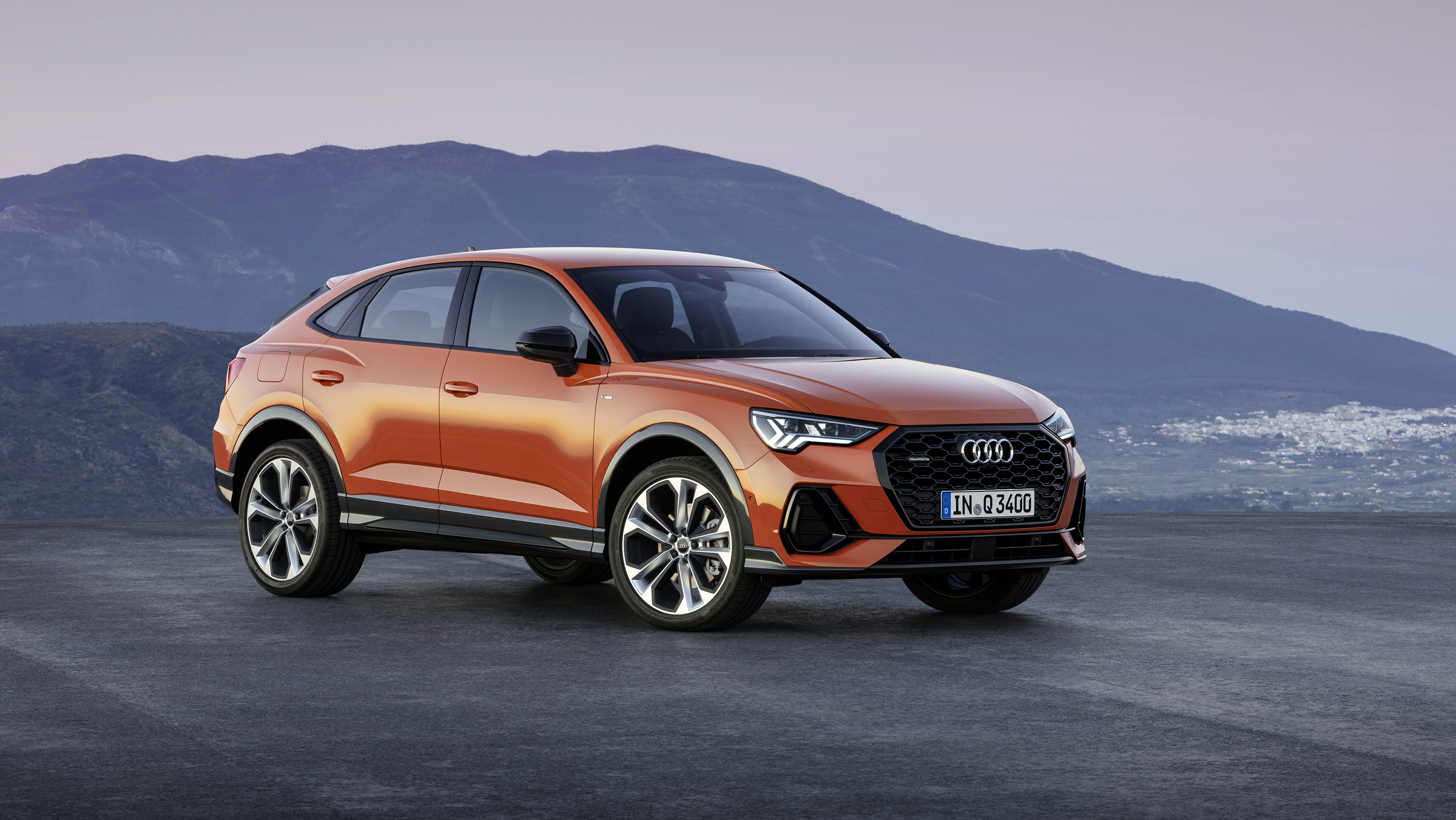 2019 Audi Q3 Sportback - front 3/4 static orange