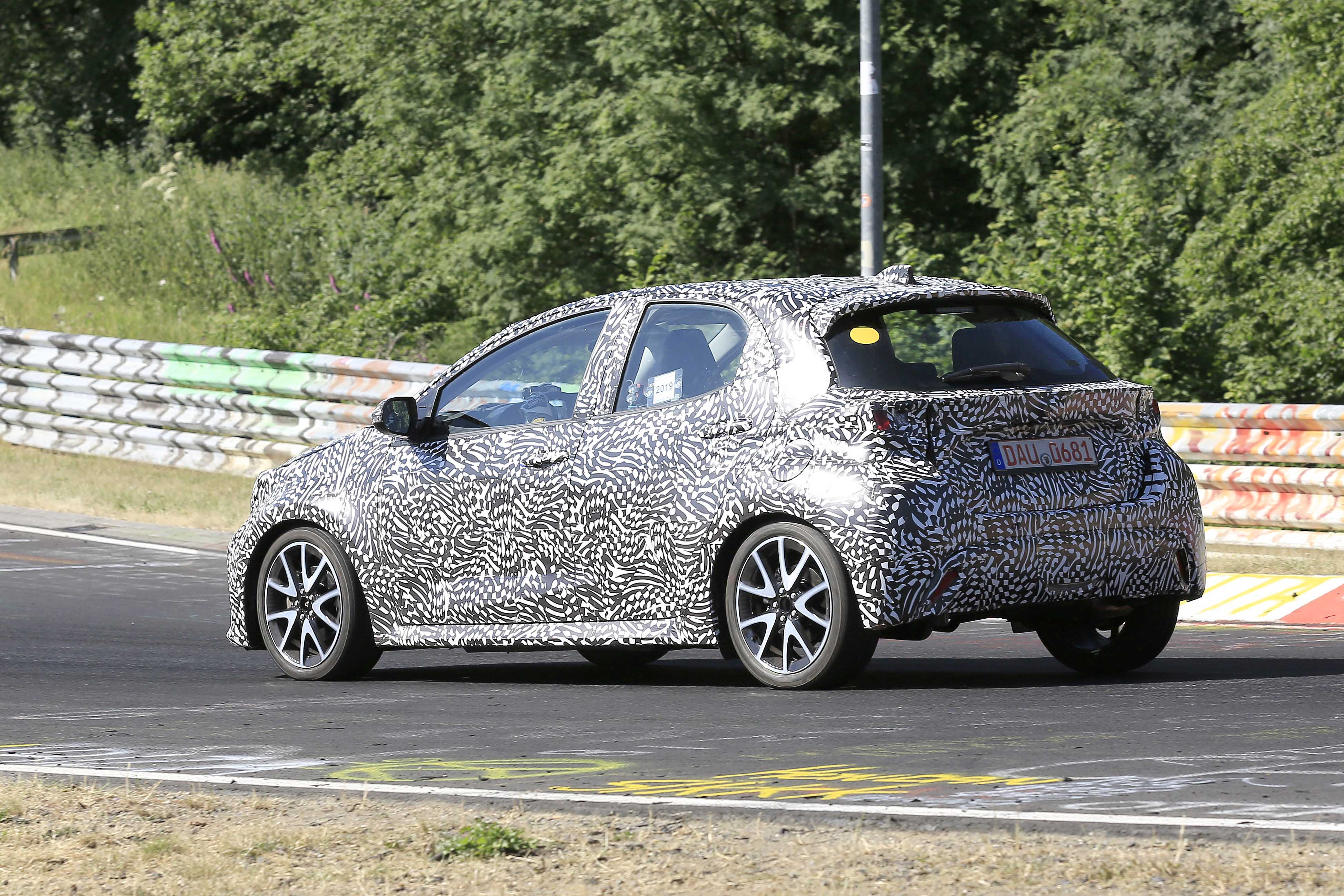 Toyota Yaris driving on circuit in camouflage