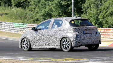 Toyota Yaris driving on circuit in camouflage