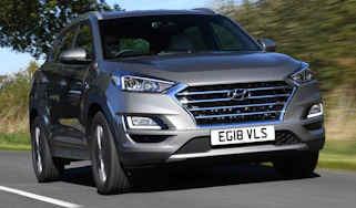 Hyundai Tucson Premium - front 3/4 driving