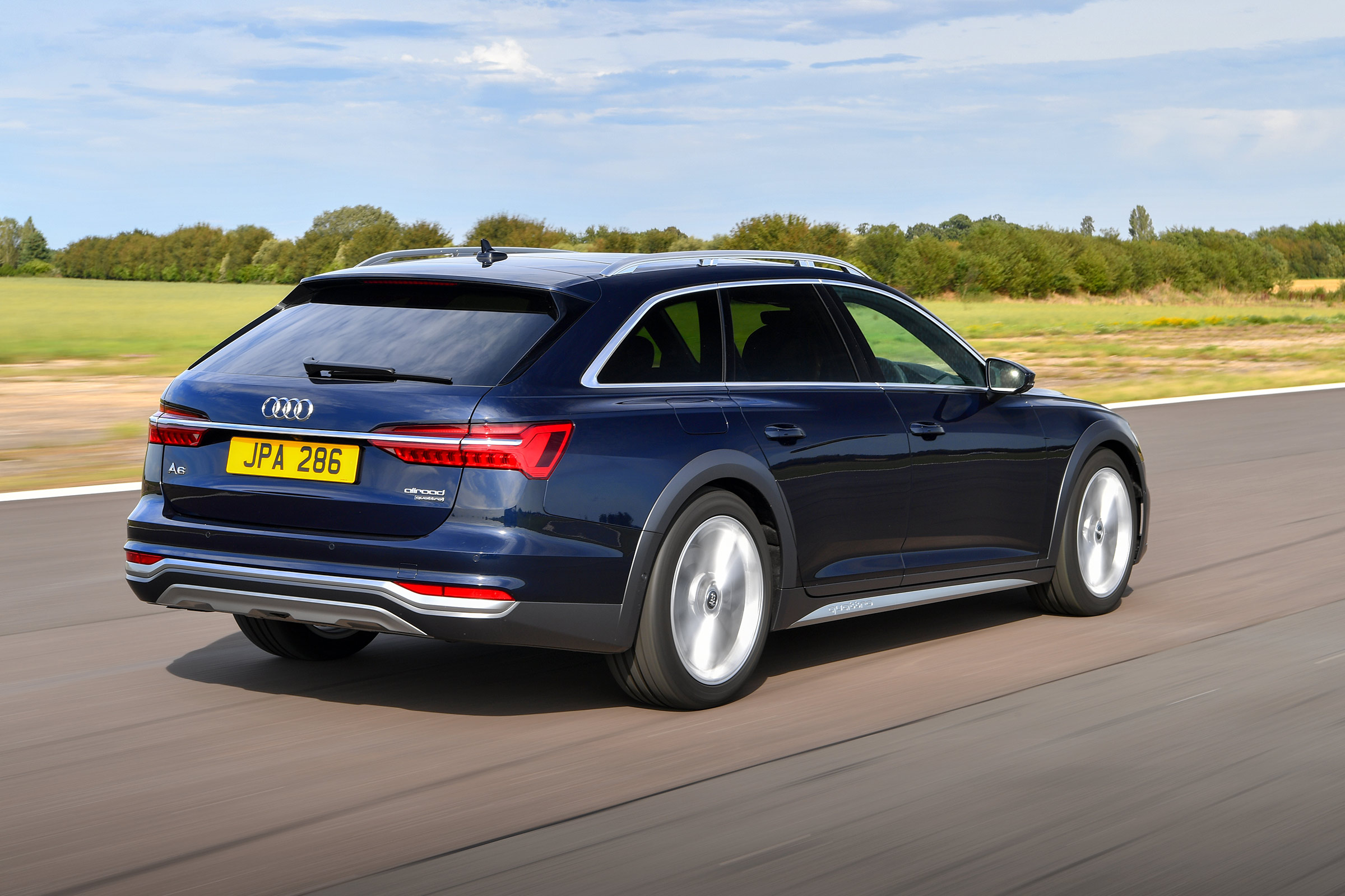 Audi A6 Allroad quattro estate rear 3/4 tracking