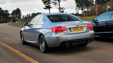 BMW 3 Series Coupe - rear 3/4 driving