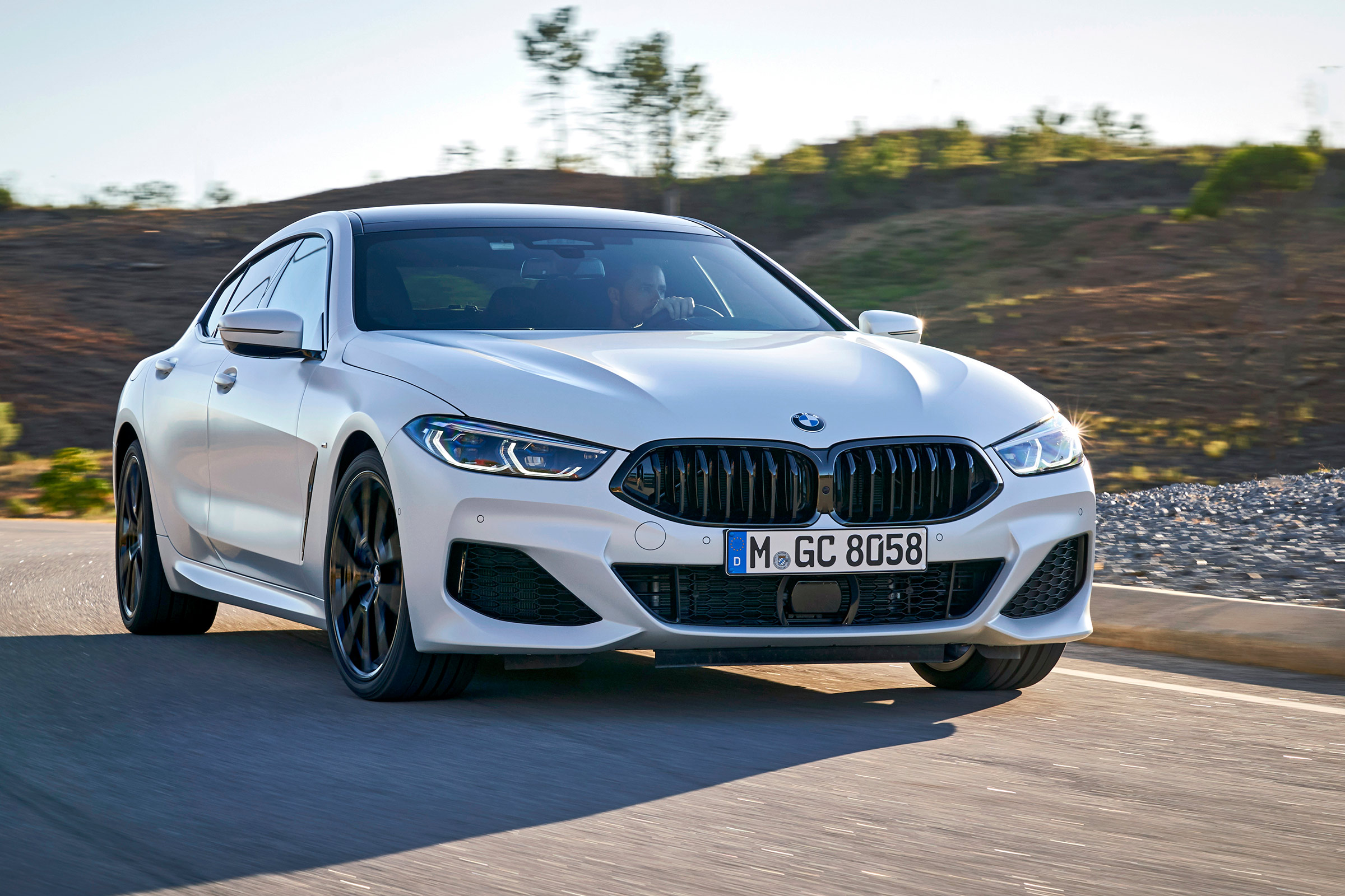 BMW 8 Series Gran Coupe saloon front 3/4 driving