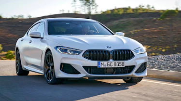 BMW 8 Series Gran Coupe saloon front 3/4 driving